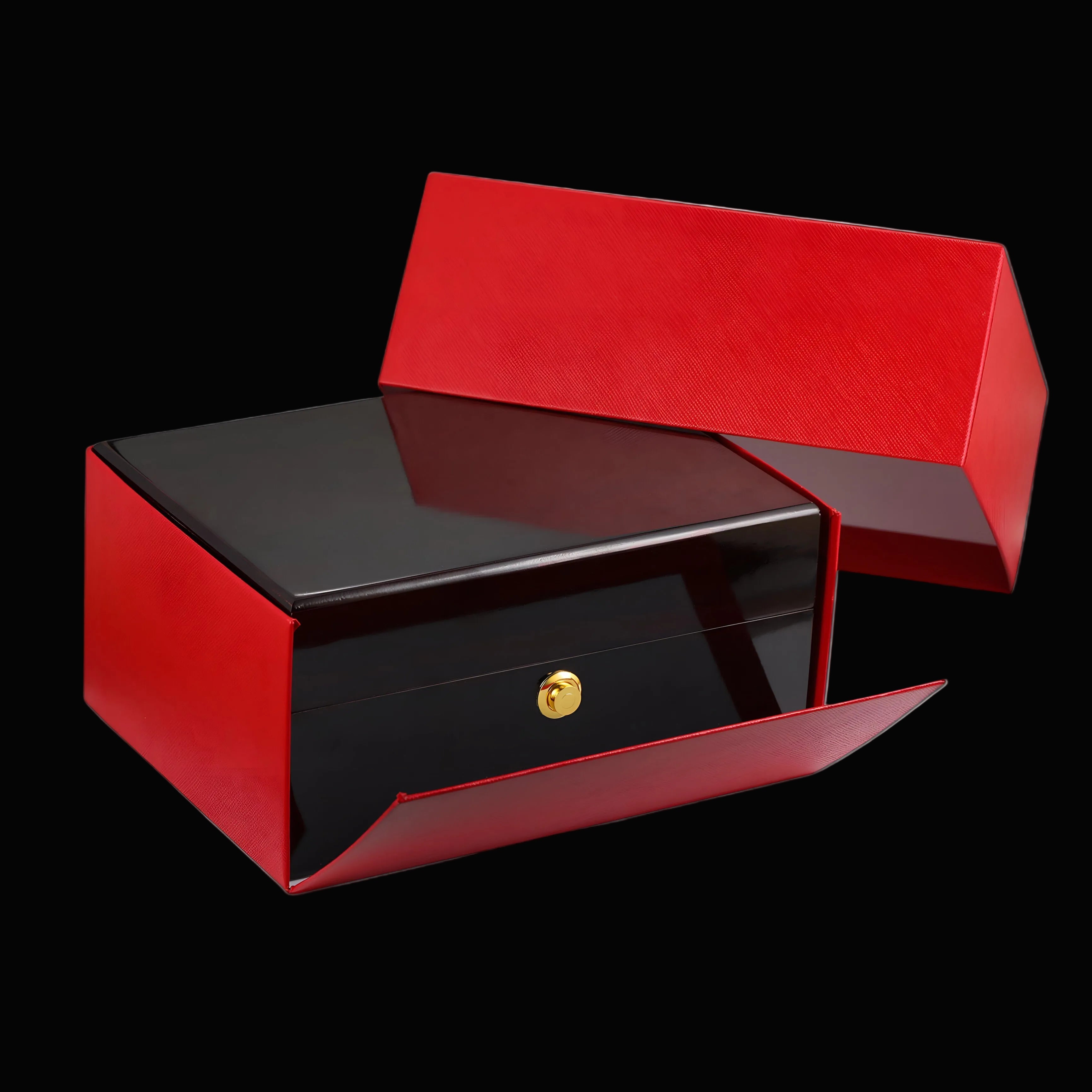 A red and black wooden jewelry box with a glossy finish, featuring a small gold button on the front and shown with its lid propped open on a white background.